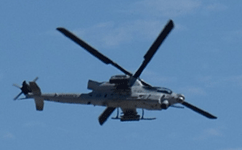 The AH-1 Cobra is on the attack during the MAGTF demo at the Miramar Air Show in San Diego, California...on September 24, 2022.