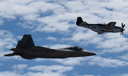 The F-22 Raptor and P-51 Mustang fly in unison during a U.S. Air Force Heritage Flight demo at the Miramar Air Show...on September 24, 2022.