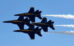 Four of the six Blue Angels soar in the sky during the final demo at the Miramar Air Show...on September 24, 2022.