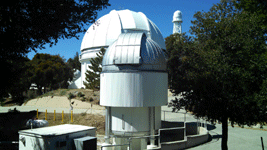 The CHARA Array interferometer (foreground), the dome housing the 60-inch telescope (middle) and one of the 150-foot solar telescopes (background)...on March 24, 2016.