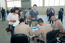 NASA Social attendees get in line to receive autographs by some of Armstrong's test pilots...on May 31, 2016.