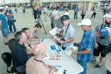 A photo that someone took of me as I was about to get autographs by the Armstrong test pilots...on May 31, 2016.