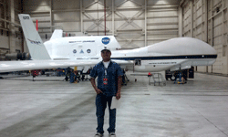 Posing with the Global Hawk UAV at NASA's Armstrong Flight Research Center...on May 31, 2016.