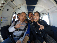 Posing for the camera as the aircraft reaches jumping altitude for my tandem skydive above Oceanside, California...on October 4, 2018.