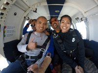 Posing for the camera as the aircraft reaches jumping altitude for my tandem skydive above Oceanside...on October 4, 2018.