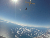 Falling away from the aircraft 13,000 feet above Oceanside for my tandem skydive...on October 4, 2018.