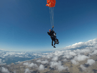 The main parachute continues to deploy several thousands of feet above Oceanside...on October 4, 2018.