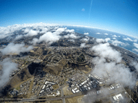 Another snapshot of Oceanside (and the Pacific Ocean) from my videographer's GoPro camera as she continues to free fall towards the landing zone...on October 4, 2018.