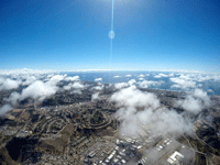 Another snapshot of Oceanside and the Pacific Ocean from my videographer's GoPro camera as she continues to free fall towards the landing zone...on October 4, 2018.