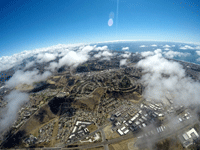 Another snapshot of Oceanside and the Pacific Ocean from my videographer's GoPro camera as she continues to free fall towards the landing zone...on October 4, 2018.