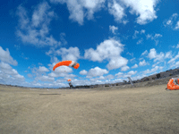 My videographer films me and my tandem instructor as we come in for a landing at the drop zone...on October 4, 2018.