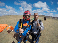 Posing with my tandem instructor after we touched down on the drop zone at Oceanside...on October 4, 2018.