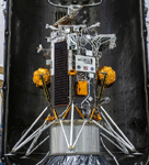 The Odysseus lunar lander before it was encapsulated by the twin payload fairings of its SpaceX Falcon 9 rocket before launch