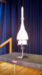 Another close-up of the Orion EFT-1 miniature model on stage.