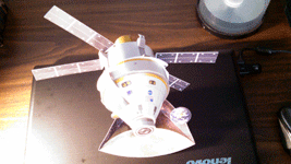 An Orion paper model that I received during the NASA Social...on display at home.