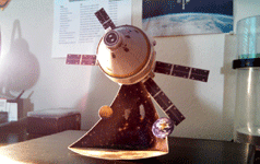 An Orion paper model that I received during the NASA Social...on display at home.