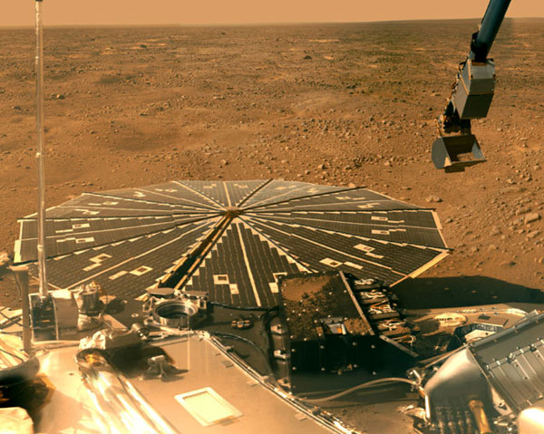 The Phoenix lander with the Martian Northern Plains in the backdrop