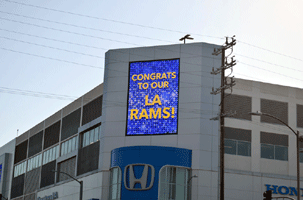 At the Los Angeles Rams' championship parade and rally after they won Super Bowl LVI.