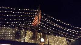 A snapshot of the American flag behind the observation deck of ENDLESS DREAMS...on October 6, 2018.