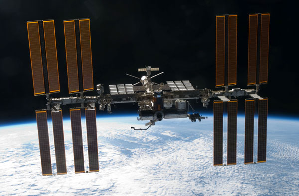 The International Space Station, as seen from space shuttle Discovery after she undocked from the orbital outpost on March 7, 2011