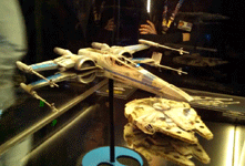 The Resistance X-Wing fighter and Millennium Falcon models from THE FORCE AWAKENS on display at Star Wars Celebration on April 17, 2015.