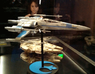 The Resistance X-Wing fighter and Millennium Falcon models from THE FORCE AWAKENS on display at Star Wars Celebration on April 17, 2015.