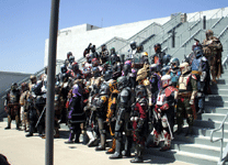 Fans dressed as Mandalorian Commandos pose for a group photo on the top balcony of the Anaheim Convention Center during Star Wars Celebration...on April 17, 2015.