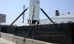 Checking out the landing legs on the Falcon 9 booster on display outside SpaceX Headquarters in Hawthorne, California...on August 25, 2016.