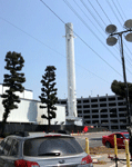 Another photo of the Falcon 9 as it towers above that parking structure...on August 25, 2016.