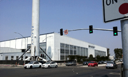 Another photo of the Falcon 9 as it towers above the main building at SpaceX Headquarters...on August 25, 2016.