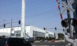 Another photo of the Falcon 9 as it towers above the main building at SpaceX Headquarters...on August 25, 2016.