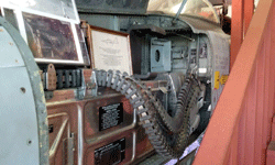 A close-up of the ammunition feed chute on the F-5A Freedom Fighter.