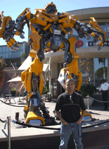 Posing in front of the life-size Bumblebee prop used in the film TRANSFORMERS.
