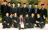 Posing for a group photo after our college graduation.