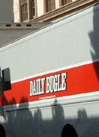The Daily Bugle van near the Hart Building with Stage 19 in the background