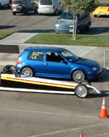 A dragster prepares to take on import cars