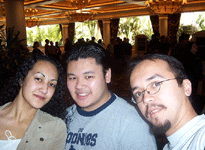 Usha, Ryan and Franz take a snapshot inside the Treasure Island lobby.