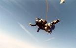 The drogue chute is deployed moments after exiting the plane.