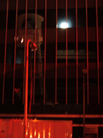 The Water Tower's reflection on the side of a New York Street facade