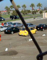 Video footage of the line of import cars preparing to drag race