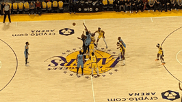 The Grizzlies receive possession of the ball after the opening tip at Crypto.com Arena...on March 7, 2023.