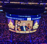 A photo of Pau Gasol, Phil Jackson and Kobe Bryant (taken after the Lakers won the 2009 NBA championship) is shown on the Jumbotron at Crypto.com Arena...on March 7, 2023.