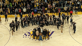 The media gathers in front of Pau Gasol and his family during the halftime ceremony at Crypto.com Arena...on March 7, 2023.